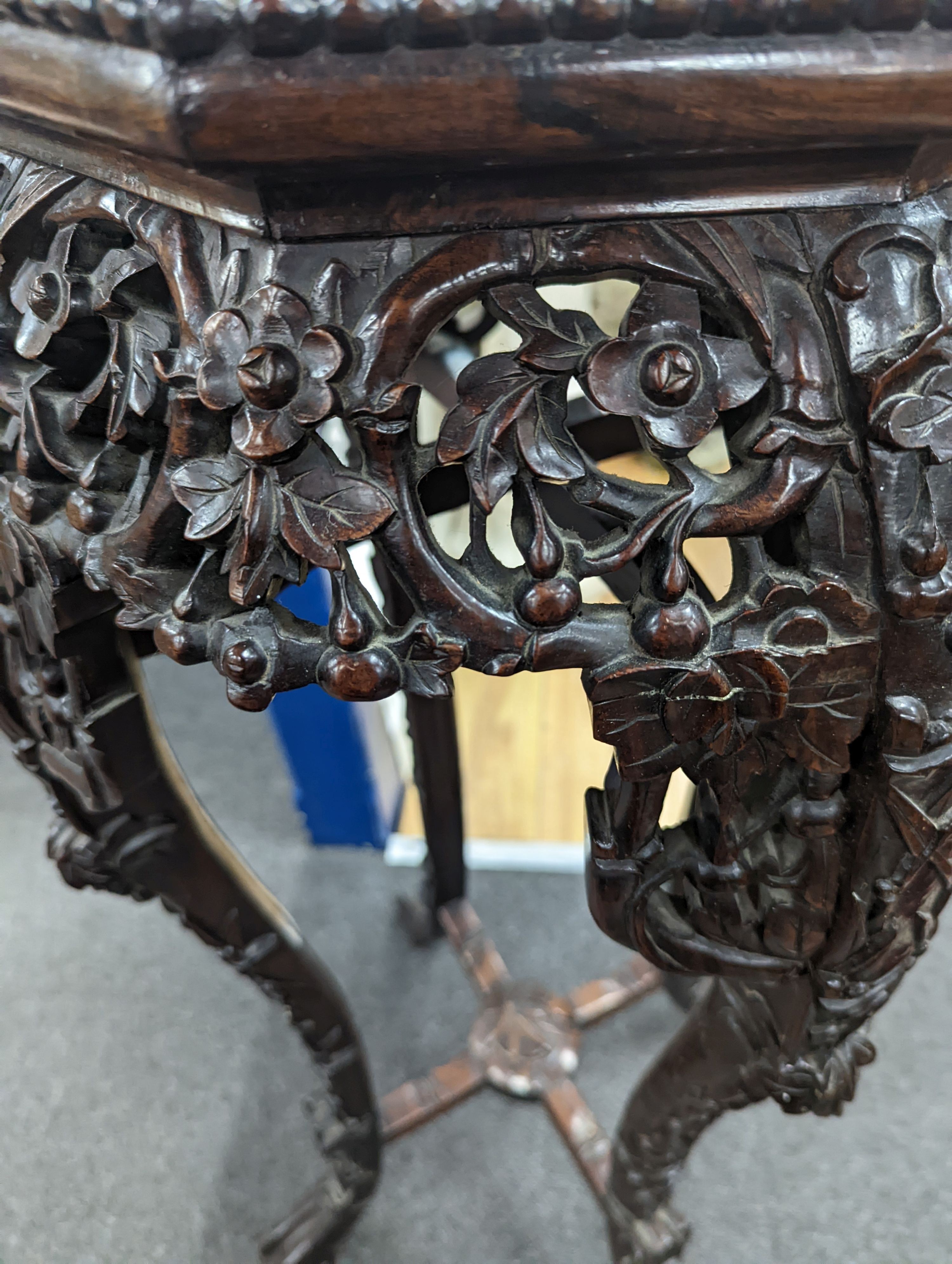 A Chinese hongmu marble topped jardiniere stand, early 20th century, height 90cm